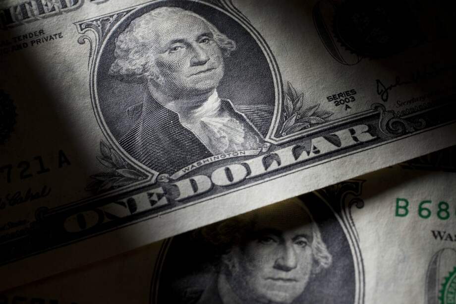 George Washington is displayed on U.S. dollar bills in New York, U.S. Photographer: Scott Eells/Bloomberg